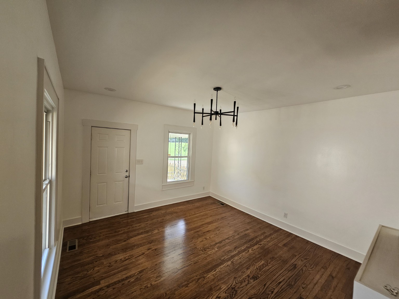 Living room — front door view at 413 East Anderson