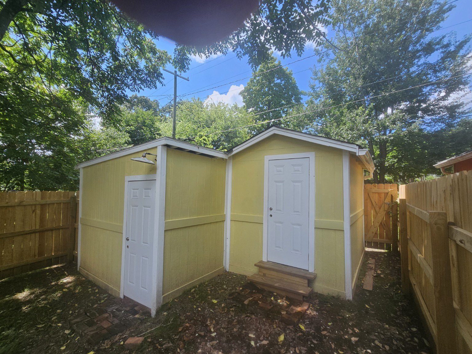 Detached two-door she shed in the backyard